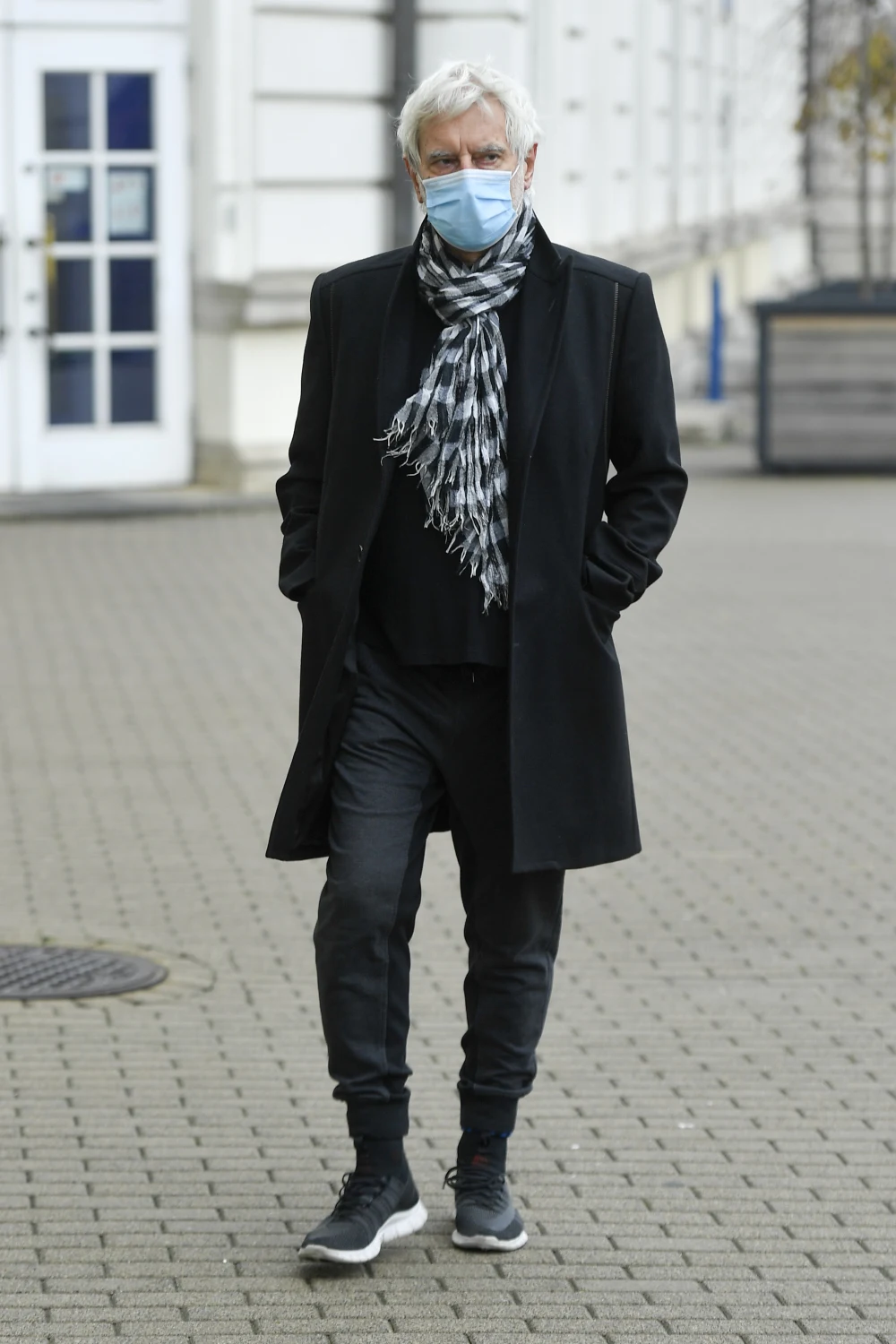 Rafał Olbiński na pogrzebie Wojciecha Pszoniaka.