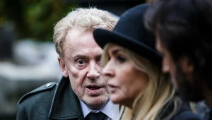 Daniel Olbrychski i Monika Olejnik na pogrzebie Andrzeja Wajdy