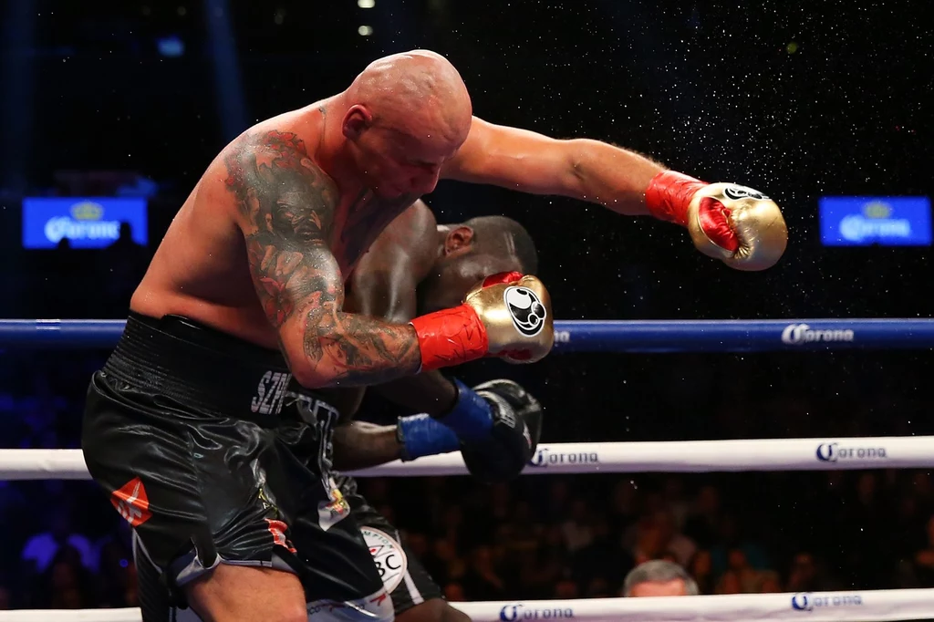 Artur Szpilka, w tle Deontay Wilder Artur Szpilka, w tle Deontay Wilder