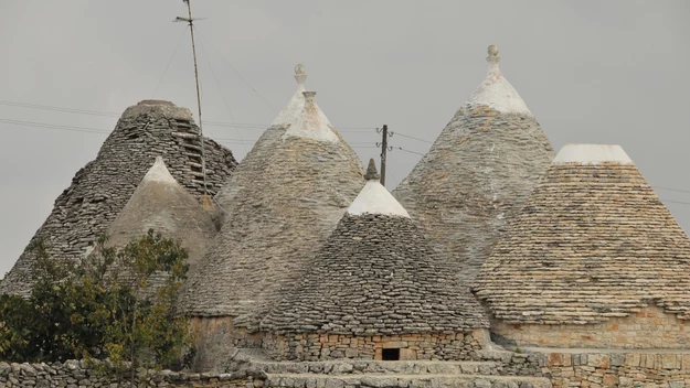 Obecnie domy trullo są atrakcją turystyczną. W niektórych można wynająć nocleg. Opr.: IG

<a href="https://www.styl.pl/podroze/zdjecie,iId,3039152,iAId,404757" target="_blank">Zobacz Ostuni. Prawdziwy włoski raj!</a>