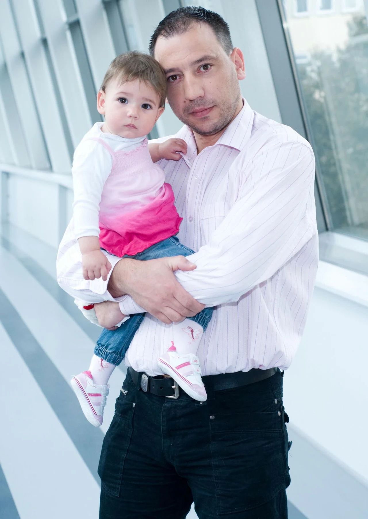 Jacek Olszewski z małą Lilianą, 2009 r.