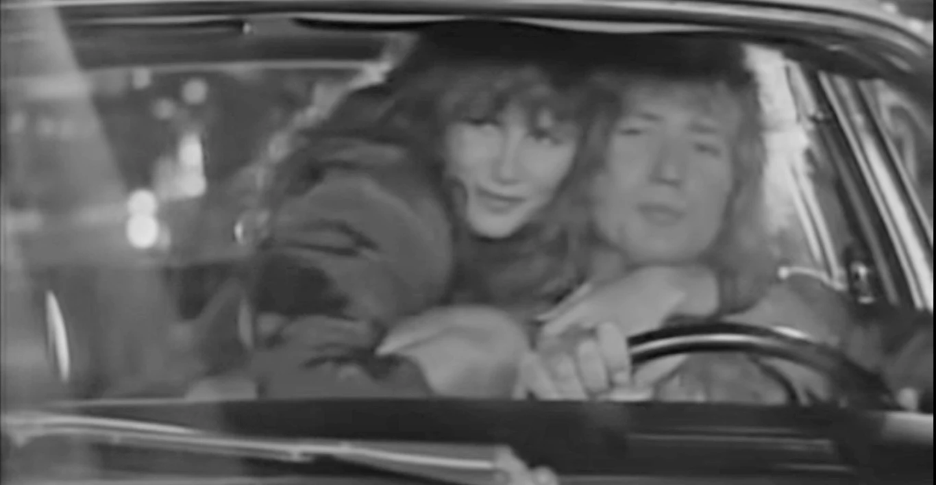 Tawny Kitaen w teledysku "Here I Go Again" Tawny Kitaen w teledysku "Here I Go Again"