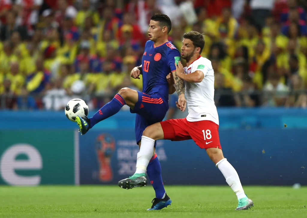 Bartosz Bereszyński - 1 turniej, 3 mecze, w sumie 170 minut gry. Na zdjęciu w walce o piłkę z Jamesem Rodriguezem z Kolumbii. Turniejowy dorobek: mundial 2018 (3 mecze) Bartosz Bereszyński - 1 turniej, 3 mecze, w sumie 170 minut gry. Na zdjęciu w walce o piłkę z Jamesem Rodriguezem z Kolumbii. Turniejowy dorobek: mundial 2018 (3 mecze)