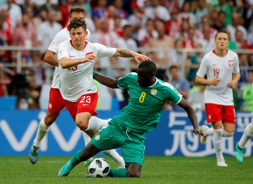 Dawid Kownacki - 1 turniej, 2 mecze, w sumie 75 minut gry. W Rosji, po niezłym wejściu w meczu z Senegalem, wyszedł w pierwszej jedenastce na spotkanie z Kolumbią. Podobnie jak cała reprezentacja Polski był jednak tego dnia bezradny. Turniejowy dorobek: mundial 2018 (2 mecze) Dawid Kownacki - 1 turniej, 2 mecze, w sumie 75 minut gry. W Rosji, po niezłym wejściu w meczu z Senegalem, wyszedł w pierwszej jedenastce na spotkanie z Kolumbią. Podobnie jak cała reprezentacja Polski był jednak tego dnia bezradny. Turniejowy dorobek: mundial 2018 (2 mecze)