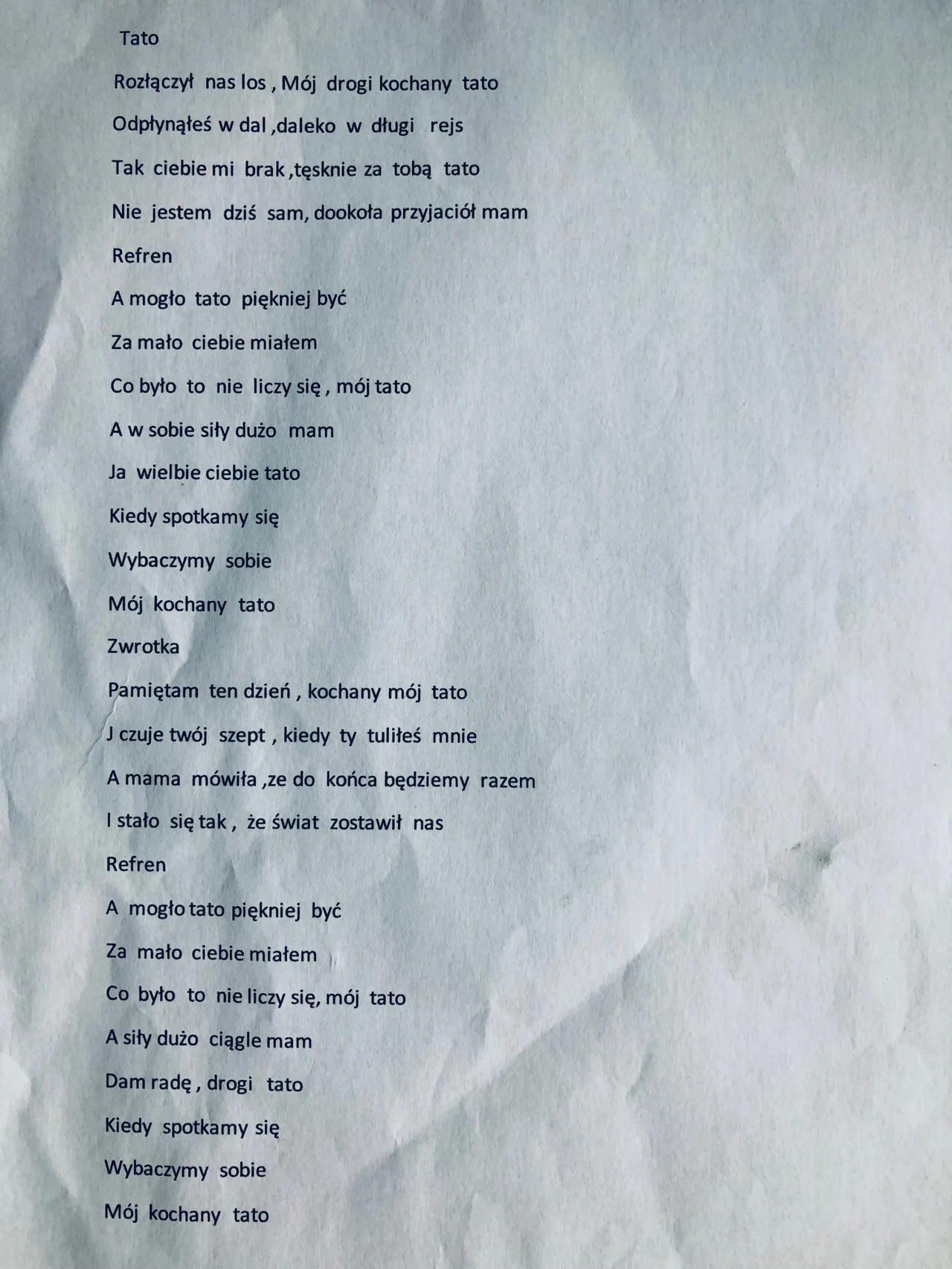 Tekst piosenki "Tato"