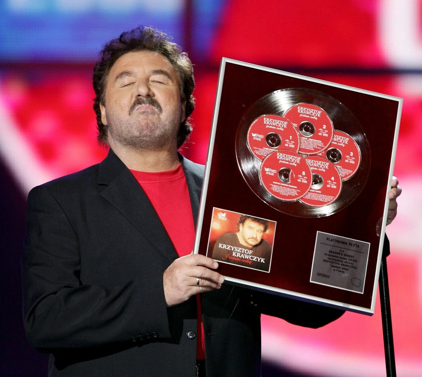 Do powrotu z emigracji był namawiany głównie przez Ninę Terentiew, która doprowadziła do renesansu jego sławy w połowie lat 90. - poprzez zaproszenie m.in. na festiwal w Sopocie czy organizację koncertów benefisowych. Dzięki kolejnym występom jego gwiazda po kilkunastu latach zaczynała błyszczeć coraz mocniejszym blaskiem. Na początku lat dwutysięcznych zaczął współpracę z Goranem Bregovicem. Ich bałkańskie przeboje spodobały się milionom Polaków, czyniąc z Krawczyka gwiazdę numer jeden w Polsce.