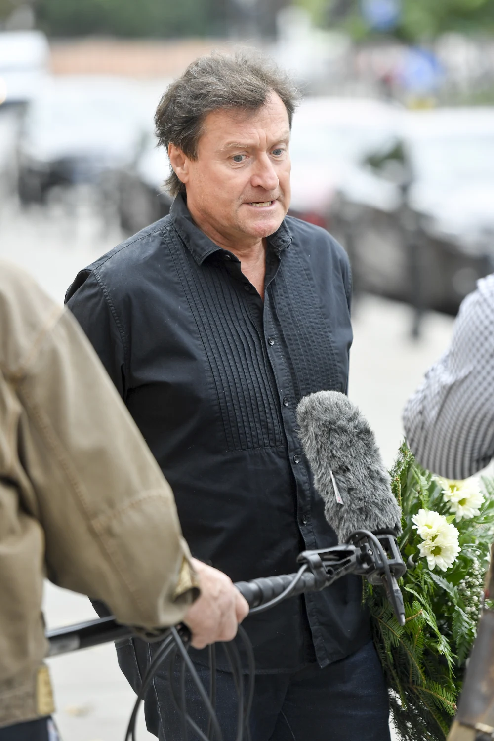 Jacek Kawalec na pogrzebie Wiesława Gołasa.