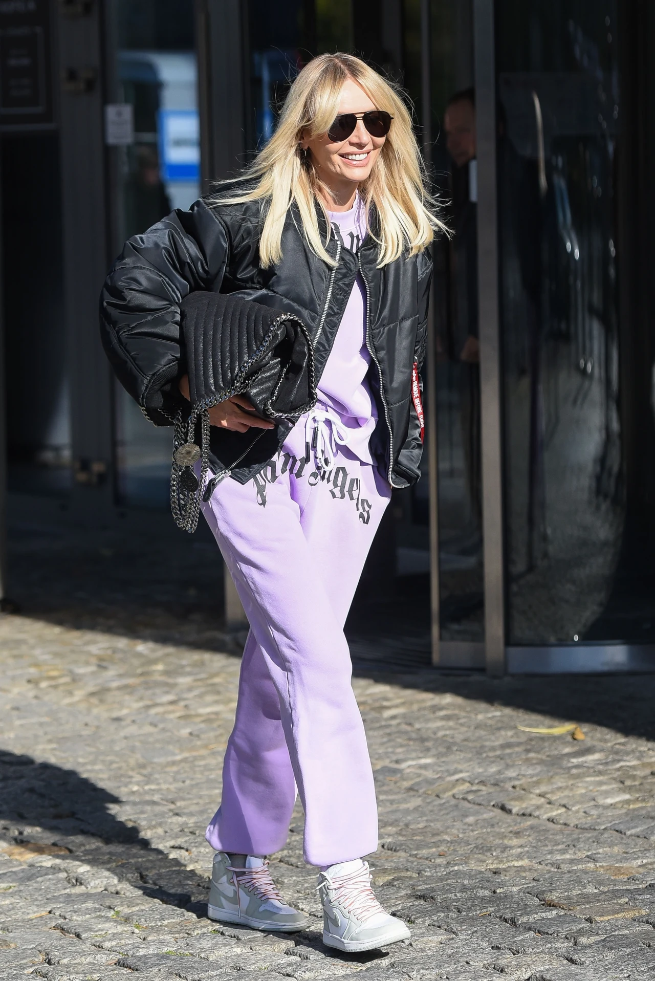 Agnieszka Woźniak-Starak w fioletowym dresie