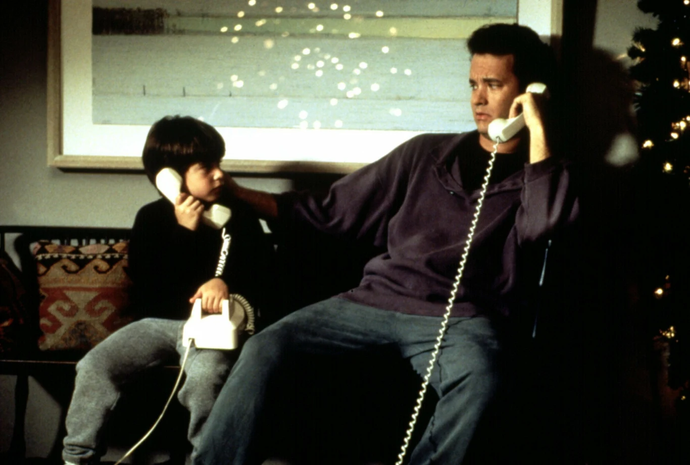 Ross Malinger i Tom Hanks w filmie "Bezsenność w Seattle", 1993 r. Ross Malinger i Tom Hanks w filmie "Bezsenność w Seattle", 1993 r.