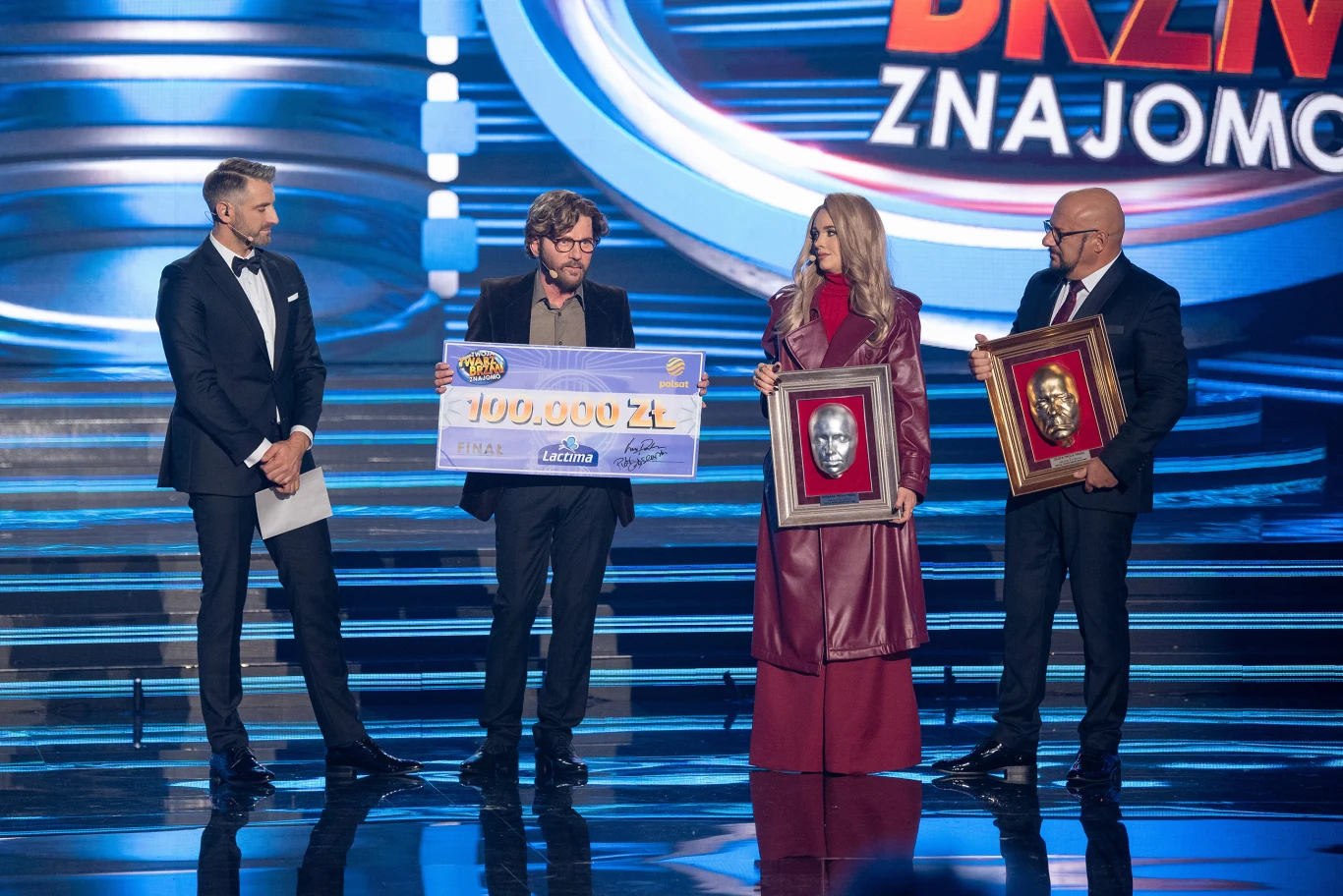 Robert "Clapton" Janowski z czekiem na 100 tysiecy złotych