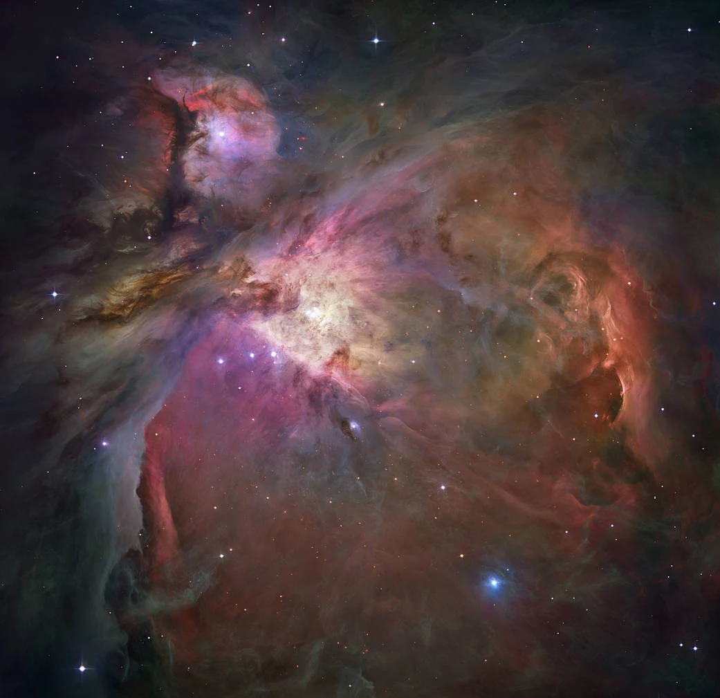 Kolejne dzieło Hubble'a - Wielka Mgławica w Orionie. Na tym obrazie znajduje się ponad 3000 gwiazd o różnych rozmiarach. Kolejne dzieło Hubble'a - Wielka Mgławica w Orionie. Na tym obrazie znajduje się ponad 3000 gwiazd o różnych rozmiarach.