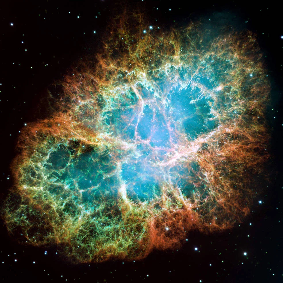 Mgławica Kraba uwieczniona przez Kosmiczny Teleskop Hubble'a. Wykonanie mozaiki złożonej z 24 ekspozycji zajęło trzy miesiące. Mgławica Kraba uwieczniona przez Kosmiczny Teleskop Hubble'a. Wykonanie mozaiki złożonej z 24 ekspozycji zajęło trzy miesiące.
