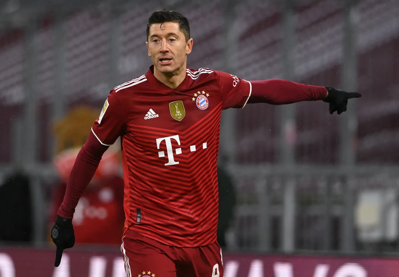 Bayern Munich's Polish forward Robert Lewandowski gestures during the German first division Bundesliga football match FC Bayern Munich v Borussia Moenchengladbach in Munich, southern Germany on January 7, 2022. Christof STACHE / AFP