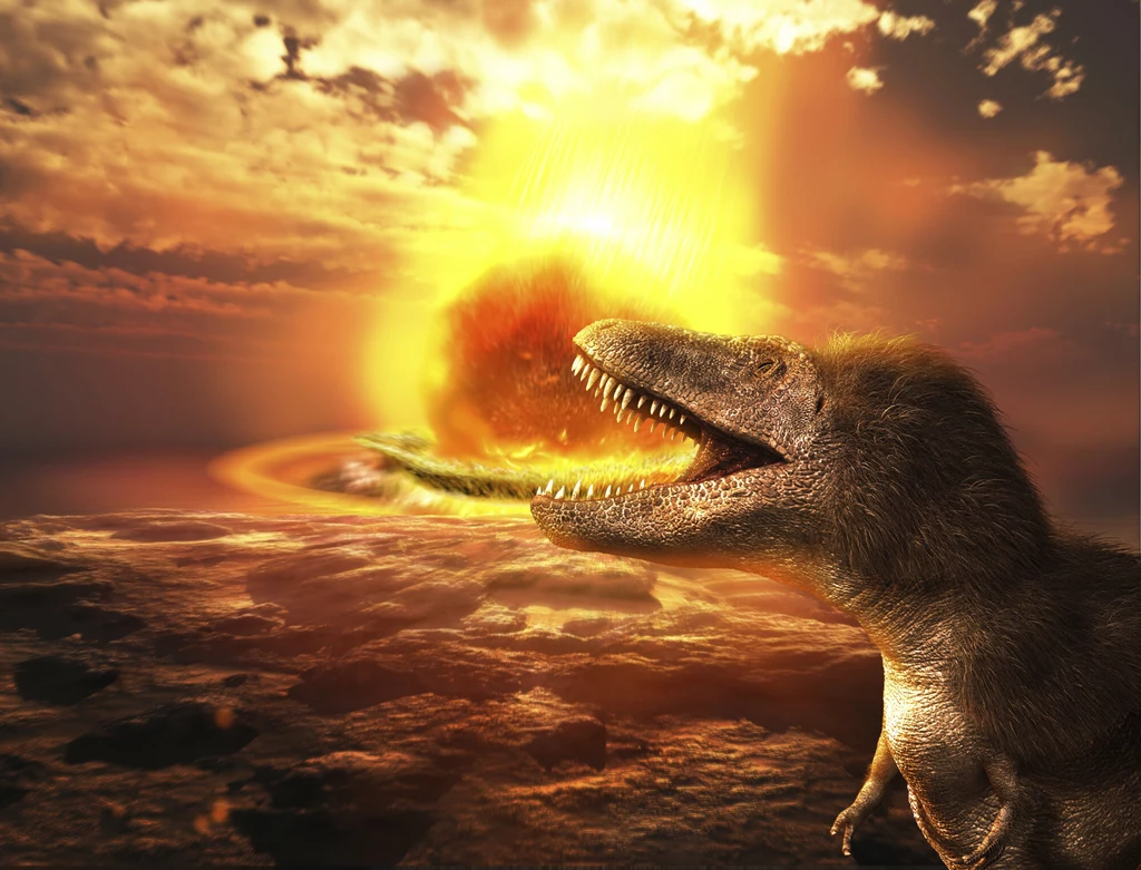 Ilustracja uderzenia asteroidy, która doprowadziła do wyginięcia nielatających dinozaurów.
