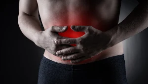 Choroba wrzodowa powoduje ból brzucha, nudności oraz uczucie sytości 