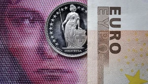 Dolar i frank bezpiecznymi przystaniami 