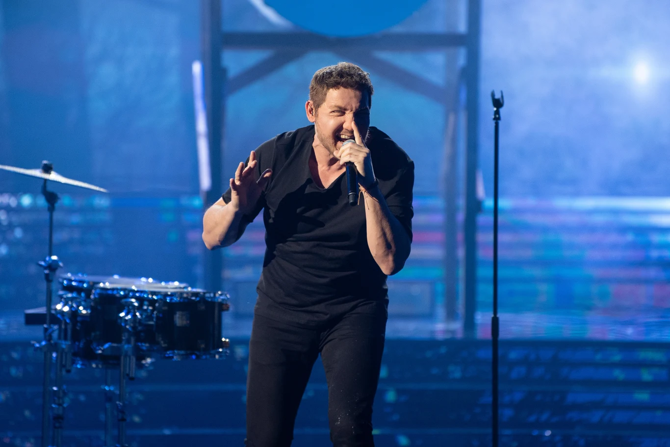 Andrzej Kozłowski jako Dan Reynolds z zespołu Imagine Dragons