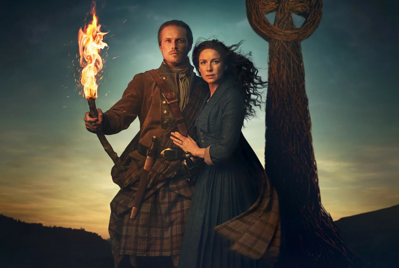"Outlander": Jamie (Sam Heughan), Claire (Caitriona Balfe)