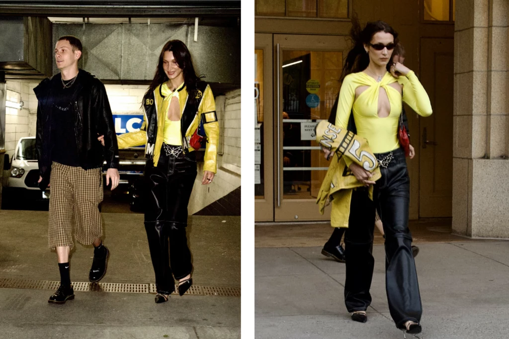 Modelka postawiła na żółty top z głębokim dekoltem, do którego dobrała czarno-biało-żółtą kurtę Yamaha