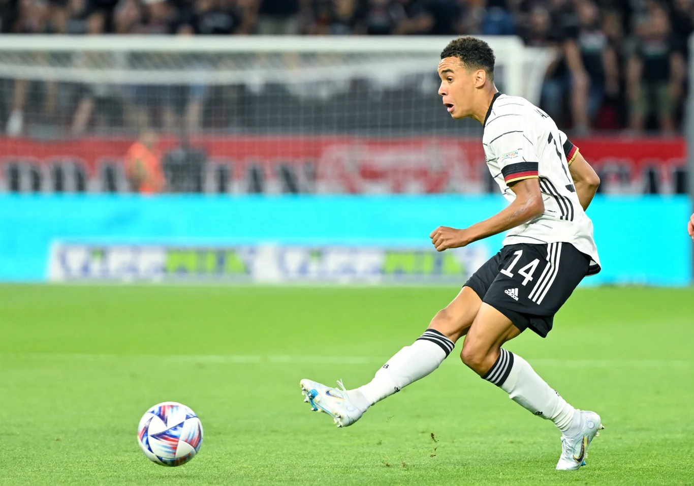 Germany's midfielder Jamal Musiala plays the ball during the UEFA Nations League football match Hungary v Germany at the Puskas Arena in Budapest on June 11, 2022. The match ended with a 1-1 draw. ATTILA KISBENEDEK / AFP Germany's midfielder Jamal Musiala plays the ball during the UEFA Nations League football match Hungary v Germany at the Puskas Arena in Budapest on June 11, 2022. The match ended with a 1-1 draw. ATTILA KISBENEDEK / AFP