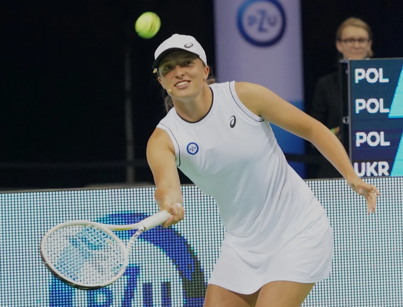 Tennis world number one Iga Swiatek of Poland plays during the charity tennis event "Iga Swiatek and Friends for Ukraine", to raise money for children and teenager affected by the war in Ukraine on July 23, 2022 in Krakow. JANEK SKARZYNSKI / AFP