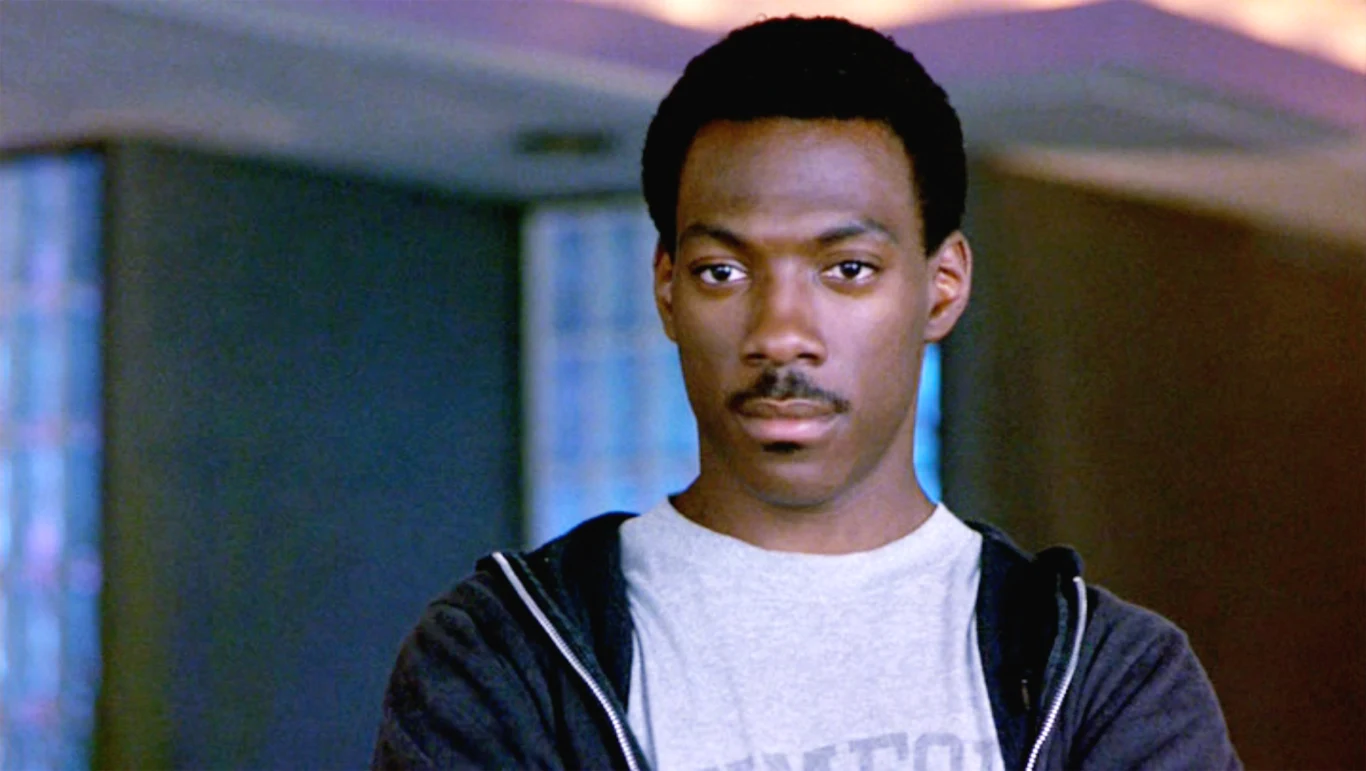 Eddie Murphy jako Axel Foley Eddie Murphy jako Axel Foley