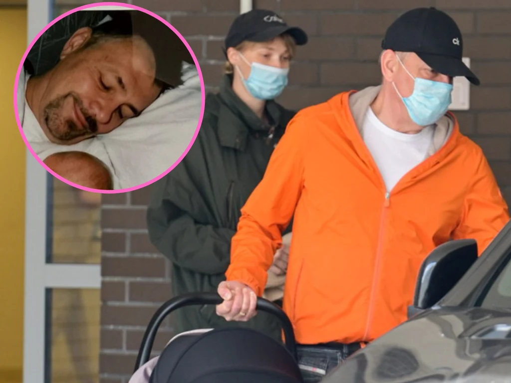 Krzysztof Ibisz wychodzi z żoną i dzieckiem ze szpitala