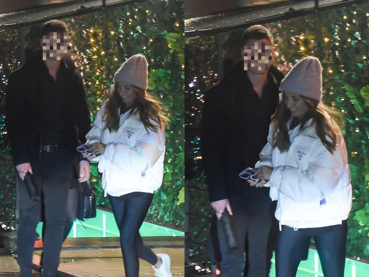 Julia Wieniawa uśmiecha się do tajemniczego mężczyzny