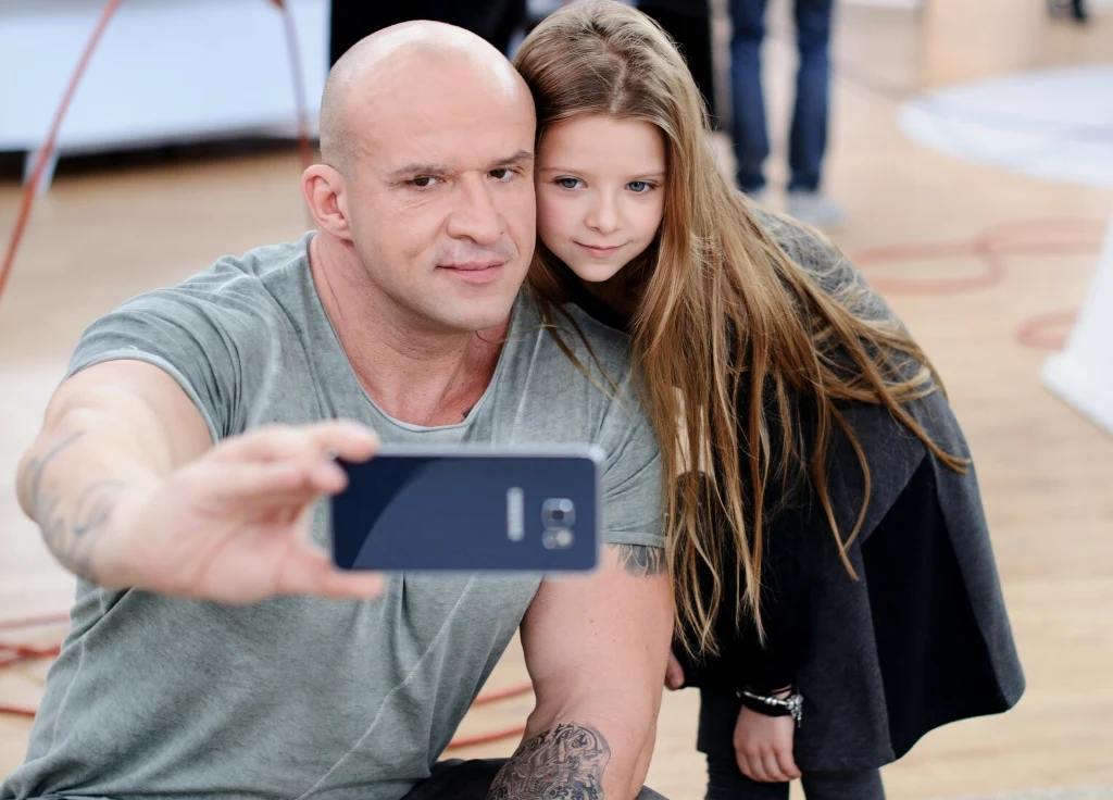 Tomasz Oświeciński z córką Mają.