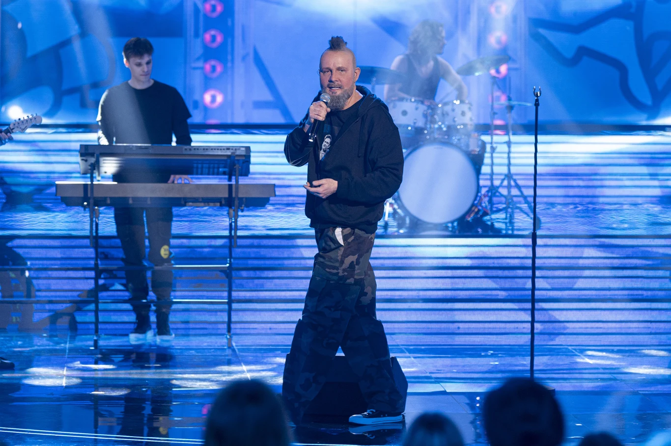 Krzysztof Ibisz jako Krzysztof "Grabaż" Grabowski z grupy Strachy Na Lachy