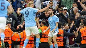 Bernardo Silva (z prawej) i Erling Haaland
