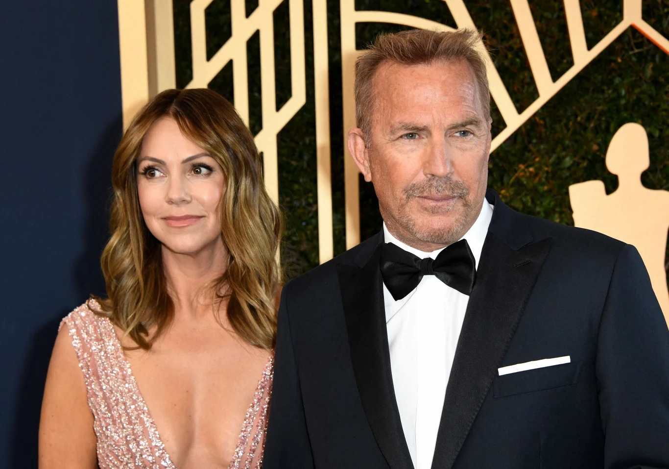 Kevin Costner i Christine Baumgartner
