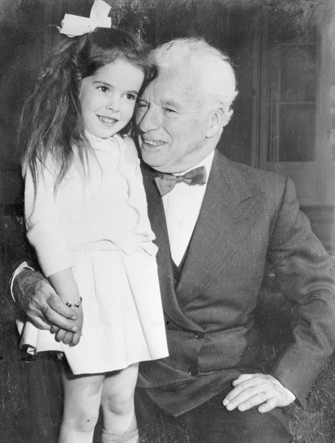 Charles Chaplin z kilkuletnią córką Josephine