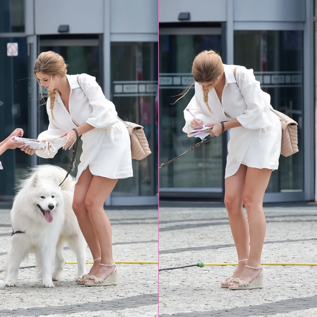 Tomaszewska cała na biało wychodzi z psem z TVP. Rozdawała też autografy (2) Tomaszewska cała na biało wychodzi z psem z TVP. Rozdawała też autografy (2)