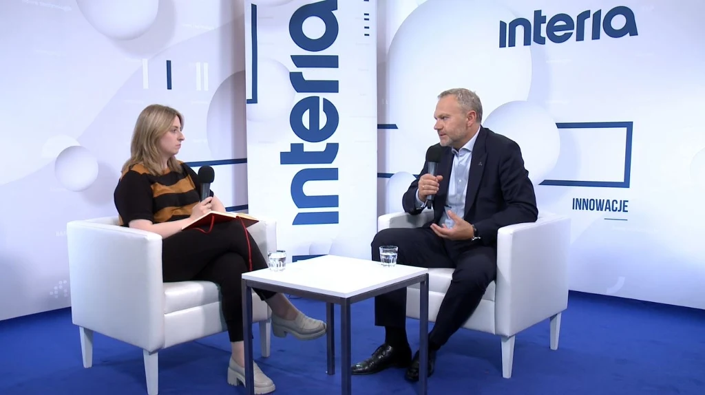 Artura Warzocha, wiceprezes Taurona w studiu Interii
