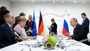 Olaf Scholz, Angela Merkel i Władimir Putin w 2019 r.