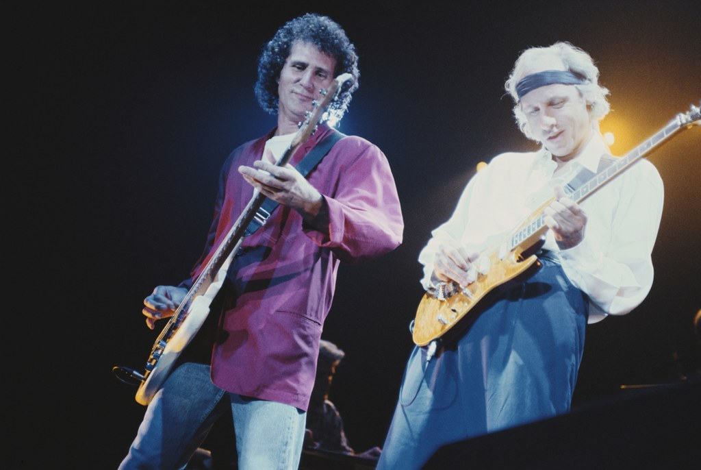 John Illsey i Mark Knopfler na scenie