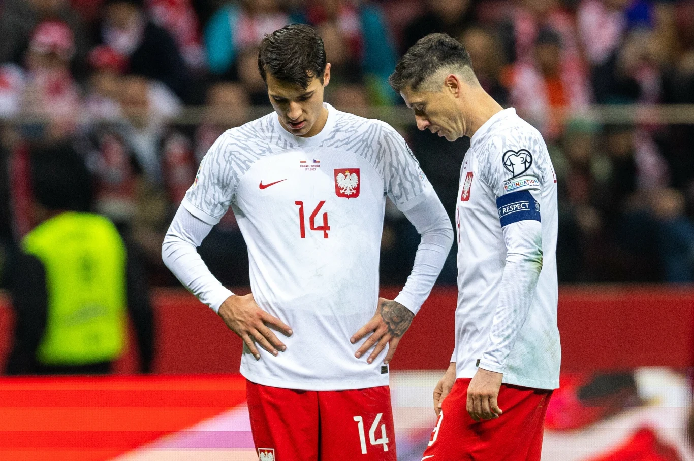 Jakub Kiwior i Robert Lewandowski