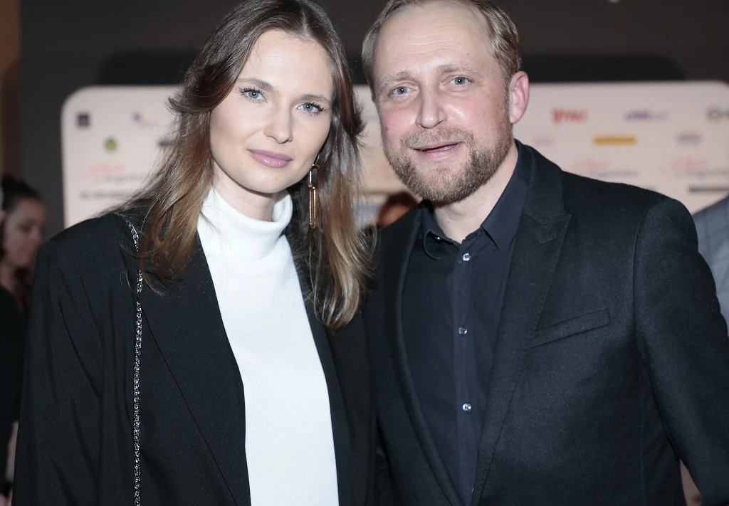 Piotr Adamczyk z żoną