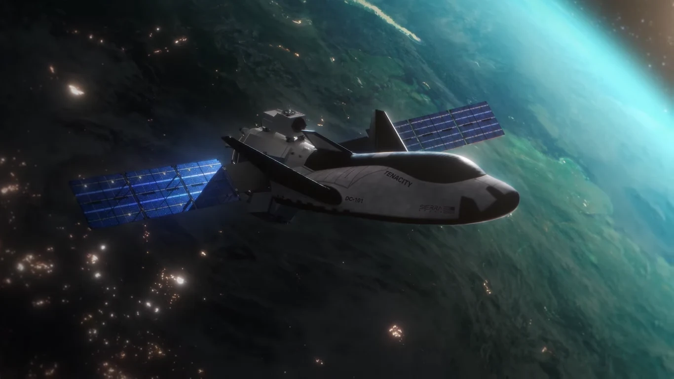 Wizualizacja wahadłowca Dream Chaser firmy Sierra Space z modułem towarowym.