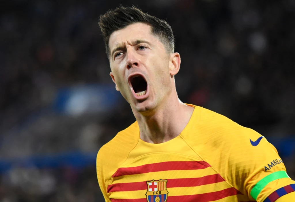 Robert Lewandowski - napastnik reprezentacji Polski - celebrujący kolejnego gola strzelonego dla FC Barcelona Robert Lewandowski - napastnik reprezentacji Polski - celebrujący kolejnego gola strzelonego dla FC Barcelona