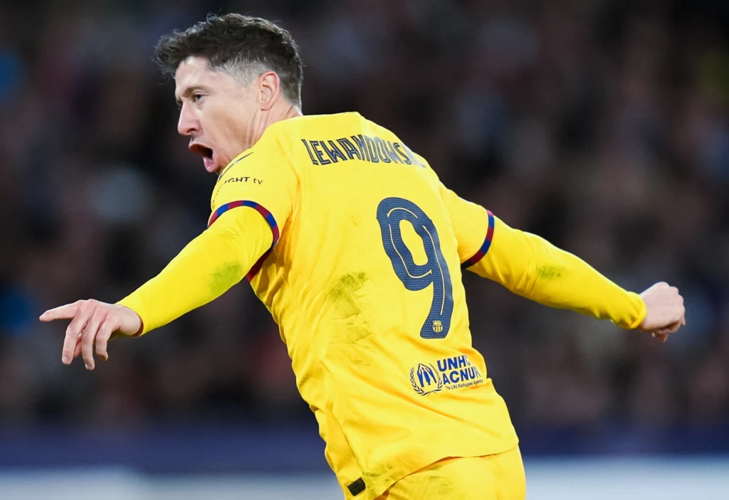 Robert Lewandowski celebrujący gola w meczu Ligi Mistrzów SSC Napoli - FC Barcelona Robert Lewandowski celebrujący gola w meczu Ligi Mistrzów SSC Napoli - FC Barcelona