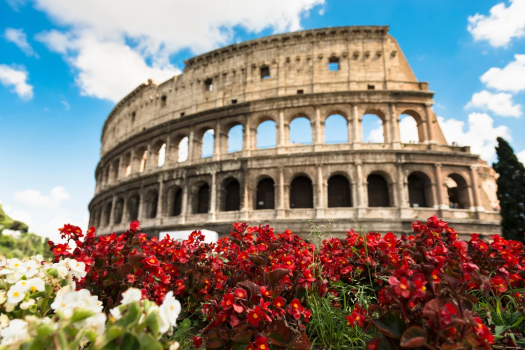 The Colosseum in Rome is covered in flowers