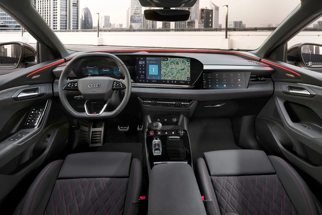 Najciekawiej we wnętrzu Audi Q6 e-tron prezentuje się jego nowy, cyfrowy kokpit. Najciekawiej we wnętrzu Audi Q6 e-tron prezentuje się jego nowy, cyfrowy kokpit.