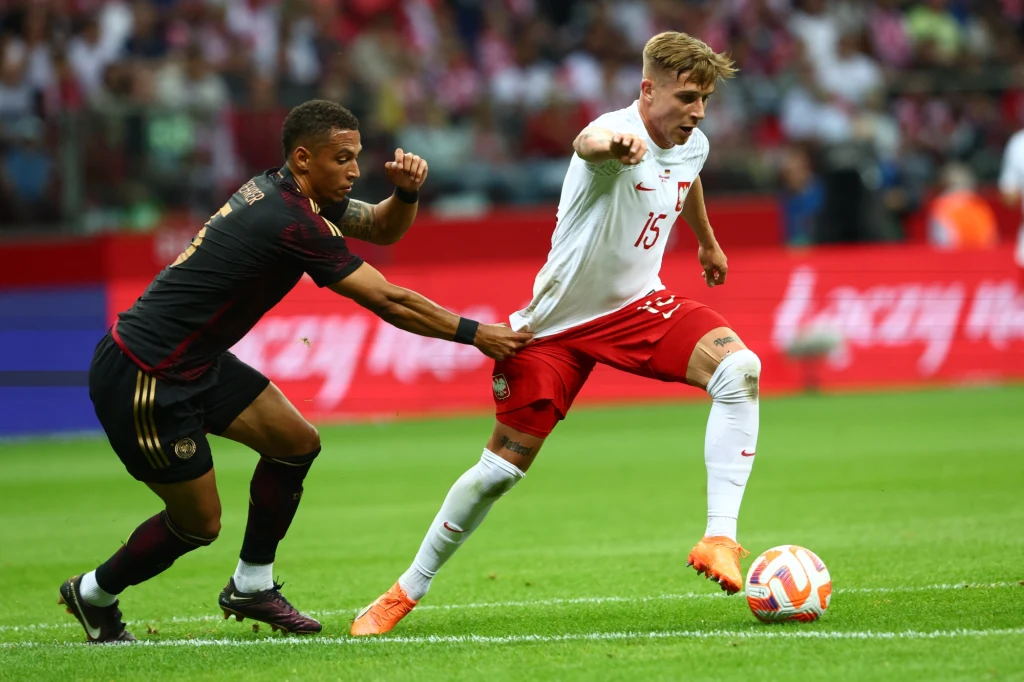 Michał Skóraś (nr 15) w koszulce reprezentacji Polski Michał Skóraś (nr 15) w koszulce reprezentacji Polski