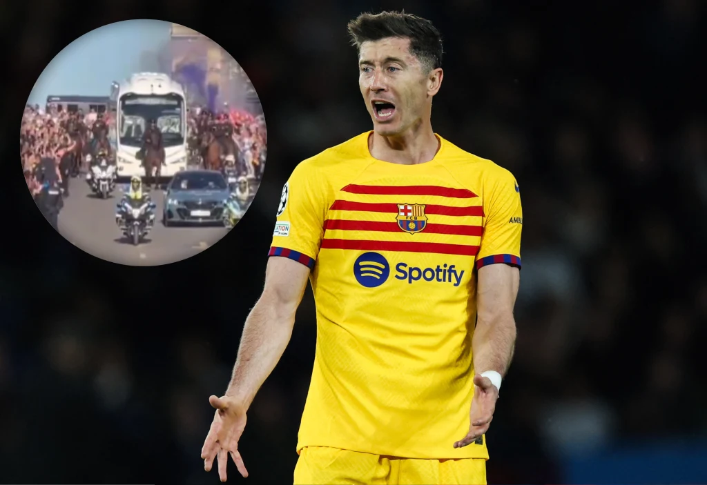 Na zdjęciu snajper FC Barcelona Robert Lewandowski oraz kibice Realu Madryt witający swoją drużynę Na zdjęciu snajper FC Barcelona Robert Lewandowski oraz kibice Realu Madryt witający swoją drużynę