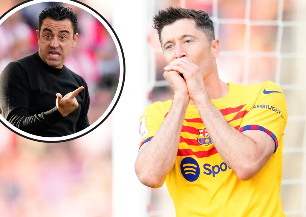 Trener FC Barcelona Xavi Herandez oraz Robert Lewandowski