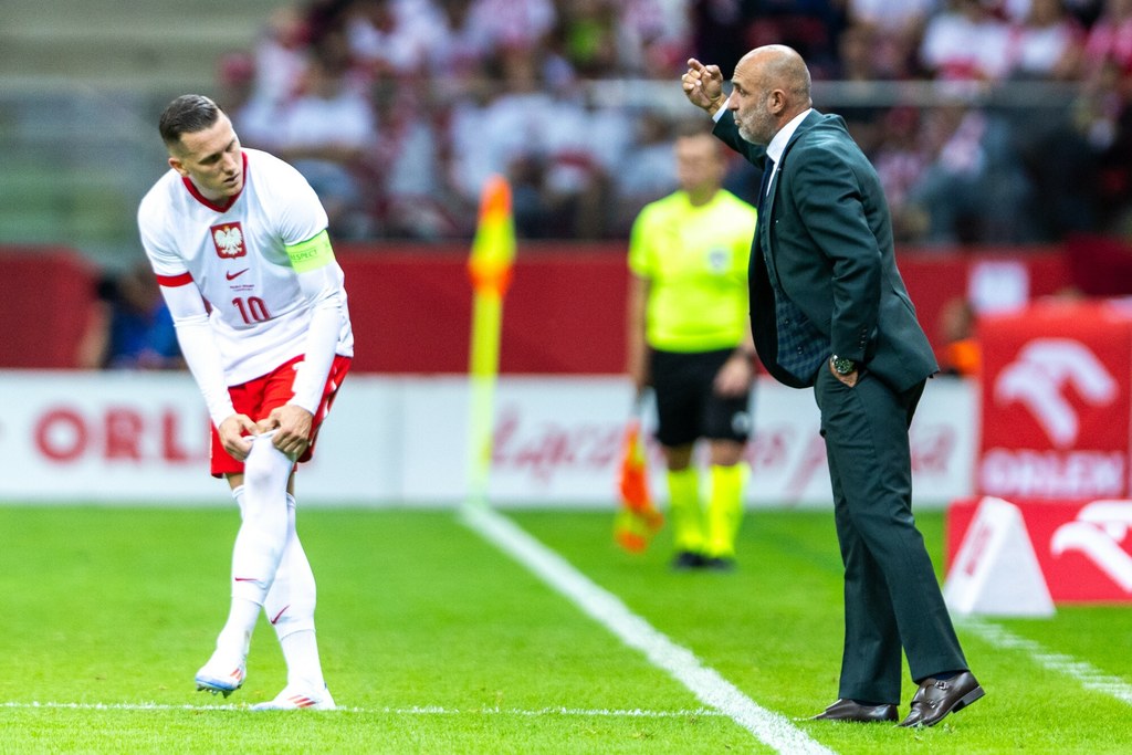 Piotr Zieliński i trener Michał Probierz