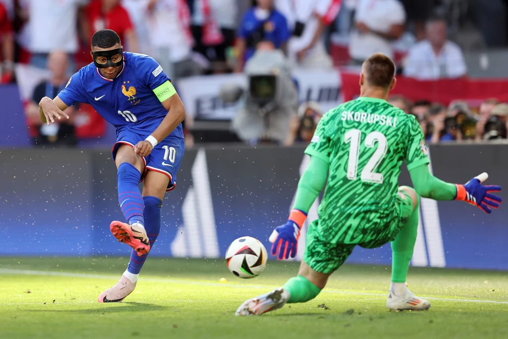 Kylian Mbappe i Łukasz Skorupski Kylian Mbappe i Łukasz Skorupski