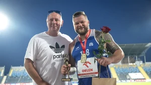 Paweł Fajdek z trenerem Szymonem Ziółkowskim